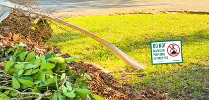pet waste sign in a swale